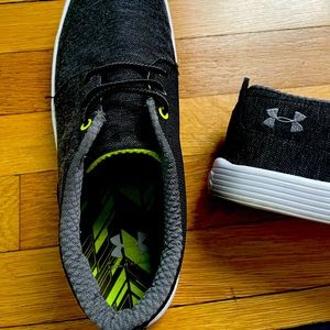 Men’s slip on dark gray Under Armor shoes worn twice.  Excellent condition.